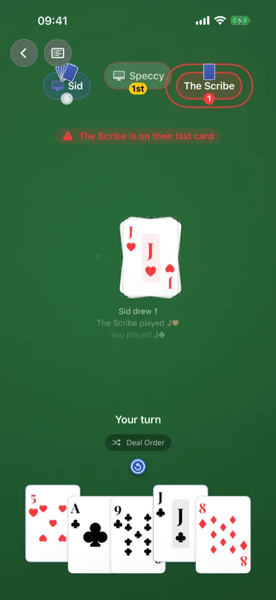 A Rachel game on iPhone: Speccy has gone out first, The Scribe is down to one card and the table is warning about it, and it is your turn